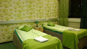 Фото номера Трехместный номер с общей ванной комнатой Мотели Motel Ruskalinna г. Пелло 4