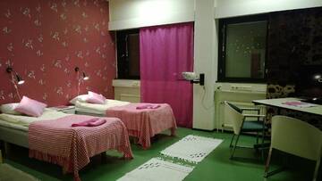 Фото номера Двухместный номер с 2 отдельными кроватями и общей ванной комнатой Мотели Motel Ruskalinna г. Пелло 2
