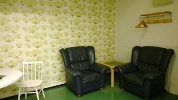 Фото номера Трехместный номер с общей ванной комнатой Мотели Motel Ruskalinna г. Пелло 3