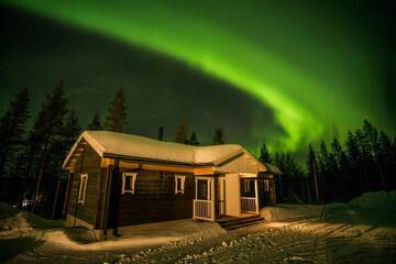 Фото номера Апартаменты с сауной Лоджи Valkea Arctic Lodge г. Пелло 10